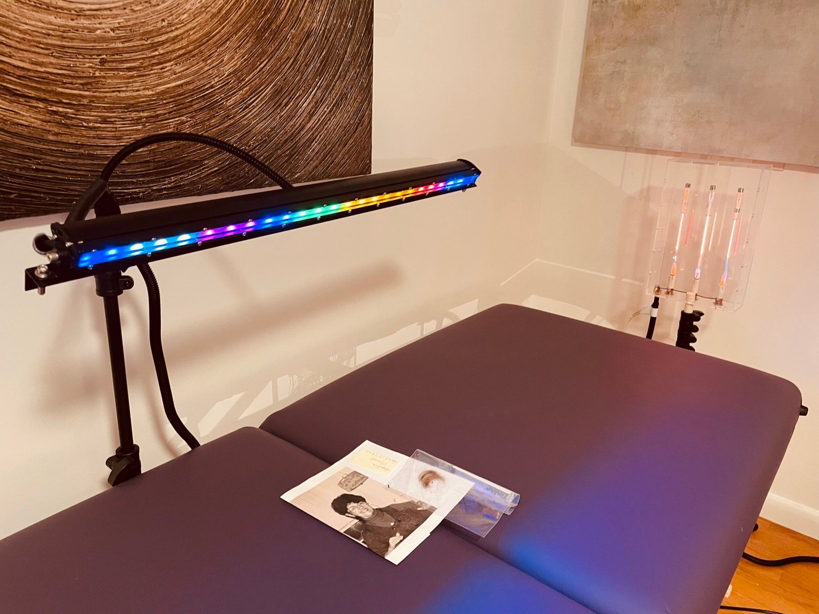Tesla Wellness Table with monochromatic chromotherapy light — remote frequency healing at The Healing Frequency Space